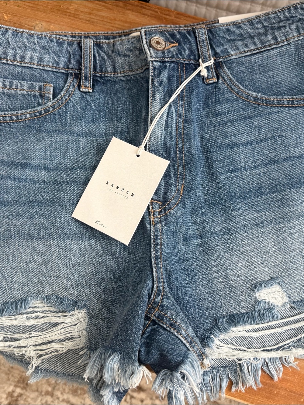 Kancan Women's Light Blue Distressed Denim Shorts